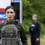 Sheriff Country Season 2 Episode 4 "Maria" -- CBS Original Series Sheriff Country, scheduled to air on Friday, Oct. 30 (8:00-9:00 PM, ET/PT), on the CBS Television Network. Pictured: Morena Baccarin as Sheriff Mickey Fox. Photo: Darren Goldstein/CBS ©2026 CBS Broadcasting, Inc. All Rights Reserved.